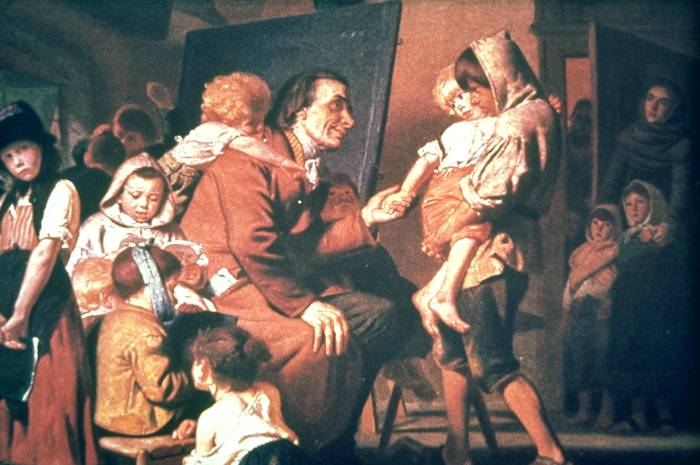 Pestalozzi sentado entre los niños huérfanos de Stans, cuadro de Konrad Grob de 1879